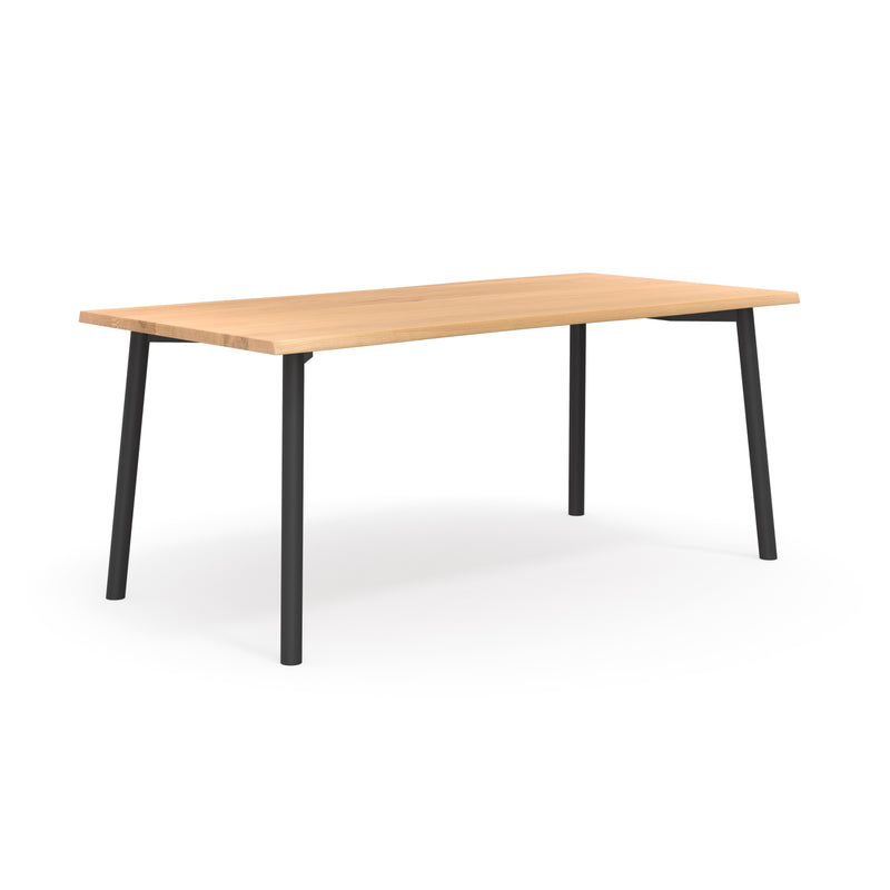 Esstisch mit Baumkante aus Massivholz mit schwarzem Gestell